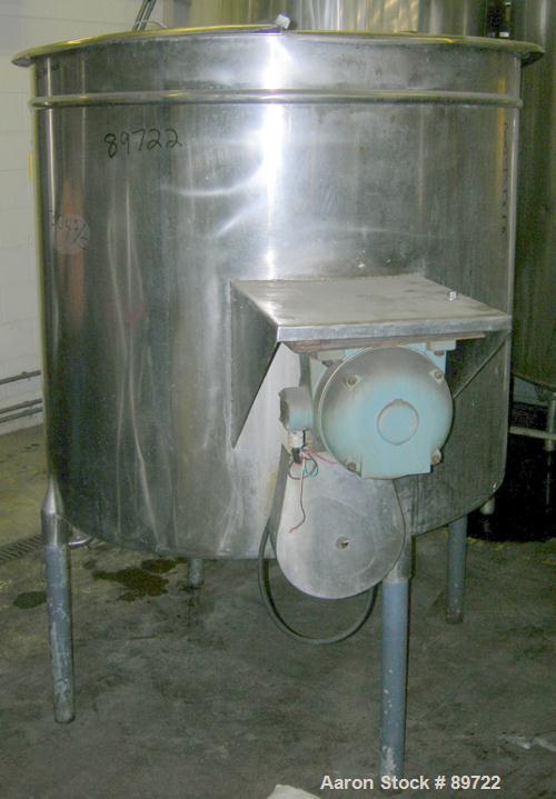 USED: Filpaco tank, 425 gallon, 304 stainless steel, vertical. 52" diameter x 47" straight side, open top with a 2 piece cover, sloped bottom. 1-1/2" off center bottom outlet. Side bottom 3 blade agi...