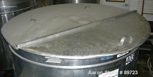 USED: Filpaco tank, 425 gallon, 304 stainless steel, vertical. 52" diameter x 47" straight side, open top with a 2 piece cover, sloped bottom. 1-1/2" off center bottom outlet. Side bottom 3 blade agi...