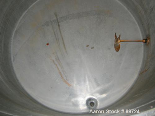 USED: Filpaco tank, 425 gallon, 304 stainless steel, vertical. 52" diameter x 47" straight side, open top with a 2 piece cover, sloped bottom. 1-1/2" off center bottom outlet. Side bottom 3 blade agi...