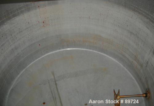 USED: Filpaco tank, 425 gallon, 304 stainless steel, vertical. 52" diameter x 47" straight side, open top with a 2 piece cover, sloped bottom. 1-1/2" off center bottom outlet. Side bottom 3 blade agi...
