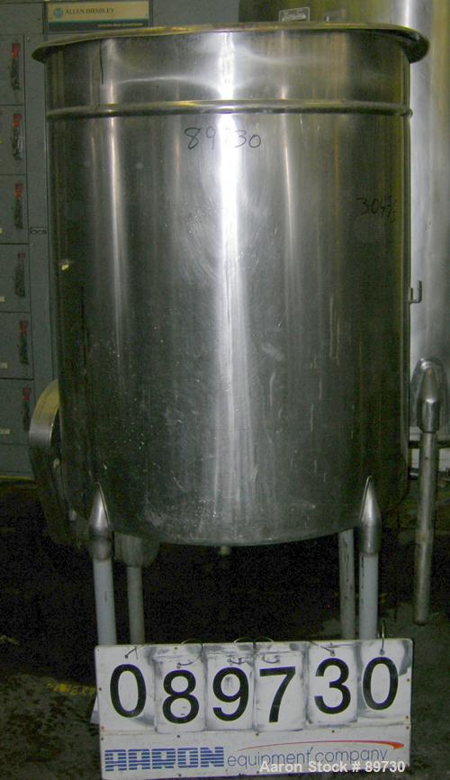 USED: Filpaco tank, 225 gallon, 304 stainless steel, vertical. 38" diameter x 46" straight side, open top with cover, flat bottom. Approximate 1-1/2" off center bottom outlet. Side bottom 4 blade agi...