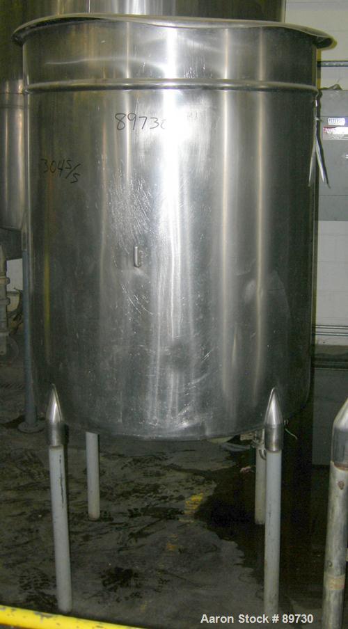 USED: Filpaco tank, 225 gallon, 304 stainless steel, vertical. 38" diameter x 46" straight side, open top with cover, flat bottom. Approximate 1-1/2" off center bottom outlet. Side bottom 4 blade agi...