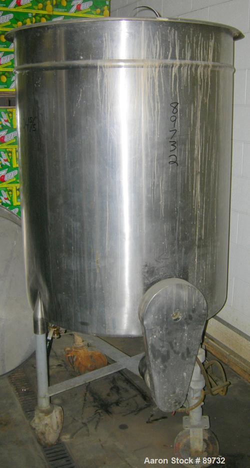 USED: Filpaco tank, 225 gallon, 304 stainless steel, vertical. 38" diameter x 46" straight side, open top with cover, flat bottom. Approximate 1-1/2" off center bottom outlet. Side bottom 3 blade agi...