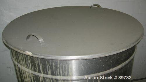 USED: Filpaco tank, 225 gallon, 304 stainless steel, vertical. 38" diameter x 46" straight side, open top with cover, flat bottom. Approximate 1-1/2" off center bottom outlet. Side bottom 3 blade agi...