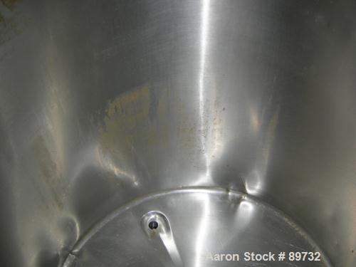 USED: Filpaco tank, 225 gallon, 304 stainless steel, vertical. 38" diameter x 46" straight side, open top with cover, flat bottom. Approximate 1-1/2" off center bottom outlet. Side bottom 3 blade agi...