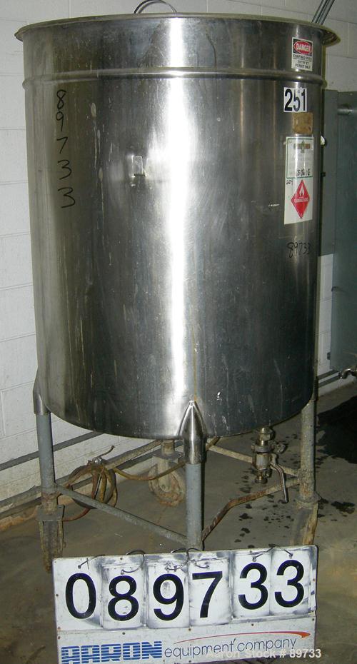 USED: Filpaco tank, 225 gallon, 304 stainless steel, vertical. 38" diameter x 46" straight side, open top with cover, flat bottom. Approximate 1-1/2" off center bottom outlet. Side bottom 3 blade agi...
