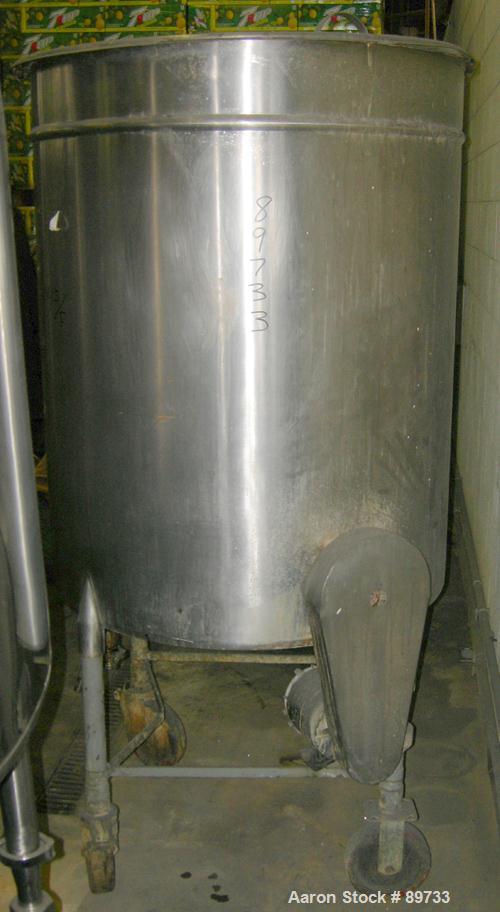 USED: Filpaco tank, 225 gallon, 304 stainless steel, vertical. 38" diameter x 46" straight side, open top with cover, flat bottom. Approximate 1-1/2" off center bottom outlet. Side bottom 3 blade agi...