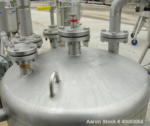 Used: Four Corp Approximately 100 Gallon, 316L Stainless Steel, Vertical.  30" diameter x 32" straight side.  Dish top and bottom.  Vessel rated 50/FV at 300 degrees F. Openings:  top (3) 2", (2) 1 1...