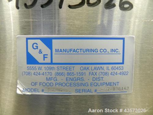 Used G&F Manufacturing Model 200GVD 200 Gallon Tank. Machine is of Stainless Steel construction. Has Vertical orientation. Approximate 38" diameter x 46" straight side. Open top with (1) 1/2 cover ((...