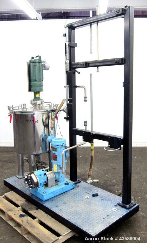 Used Graco Mixing System consisting of: (1) 45 Gallon Stainless Steel Graco Tan