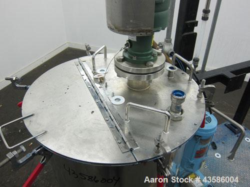 Used Graco Mixing System consisting of: (1) 45 Gallon Stainless Steel Graco Tan