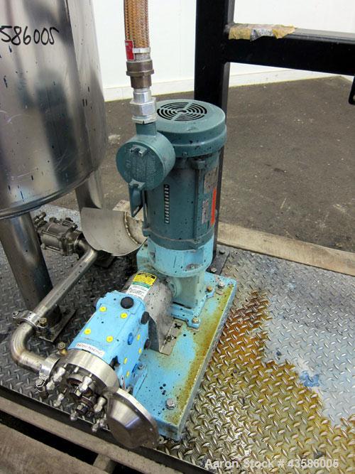 Used Graco Mixing System consisting of: (1) 45 Gallon Stainless Steel Graco Tan