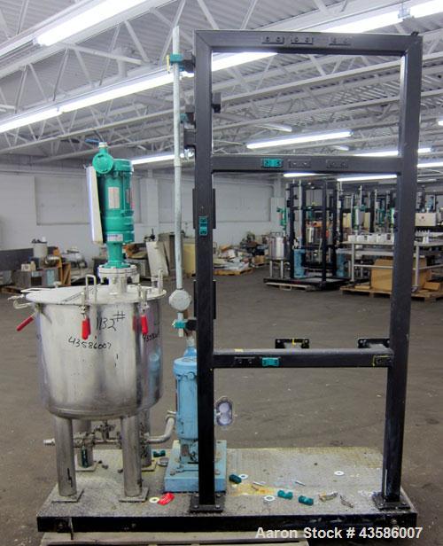 Used- Graco Mixing System consisting of: (1) 45 Gallon Stainless Steel Graco Tan