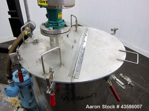 Used Graco Mixing System consisting of: (1) 45 Gallon Stainless Steel Graco Tan