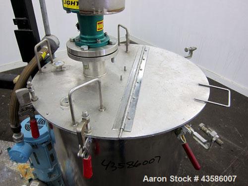 Used- Graco Mixing System consisting of: (1) 45 Gallon Stainless Steel Graco Tan