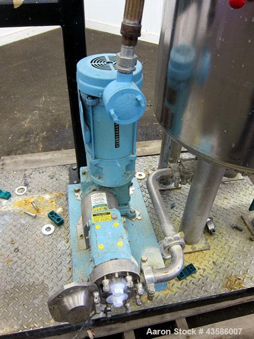 Used Graco Mixing System consisting of: (1) 45 Gallon Stainless Steel Graco Tan