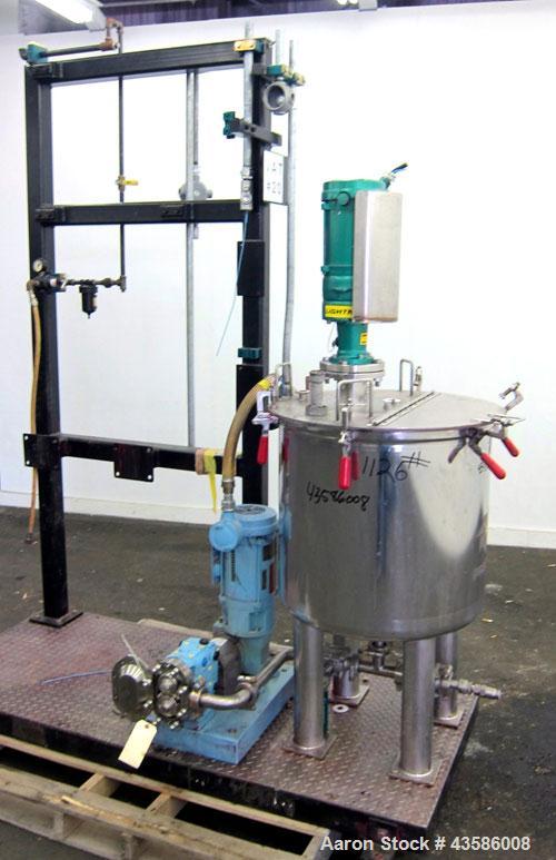 Used Graco Mixing System consisting of: (1) 45 Gallon Stainless Steel Graco Tan