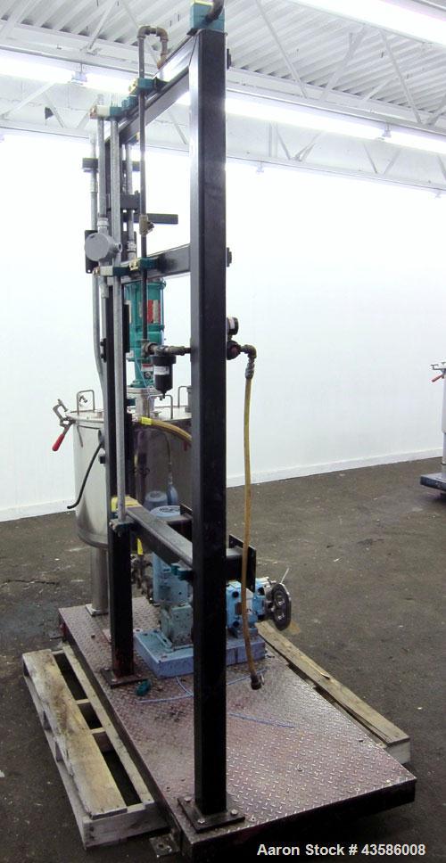Used Graco Mixing System consisting of: (1) 45 Gallon Stainless Steel Graco Tan