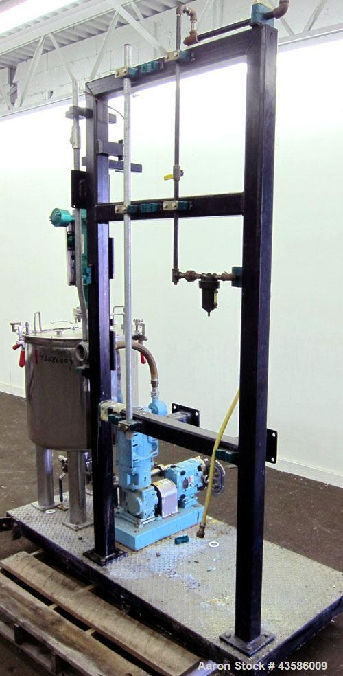 Used Graco Mixing System consisting of: (1) 45 Gallon Stainless Steel Graco Tan