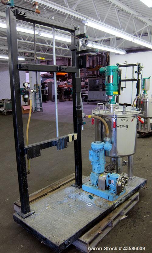 Used Graco Mixing System consisting of: (1) 45 Gallon Stainless Steel Graco Tan