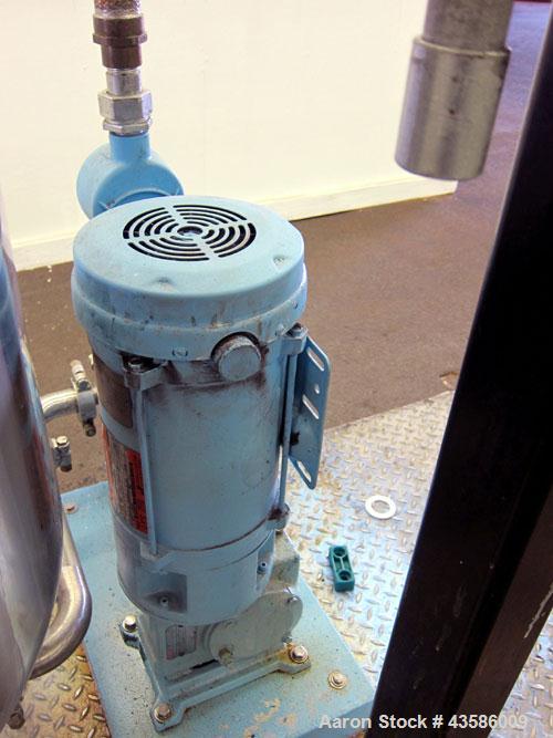 Used Graco Mixing System consisting of: (1) 45 Gallon Stainless Steel Graco Tan