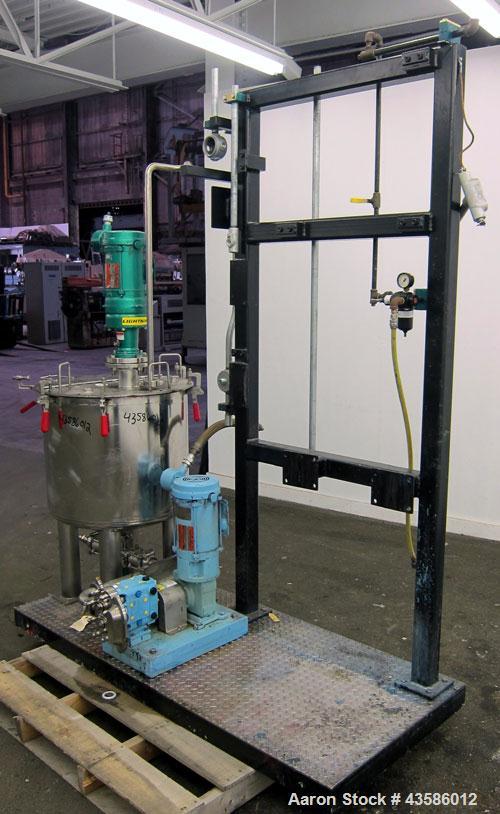 Used Graco Mixing System consisting of: (1) 45 Gallon Stainless Steel Graco Tan