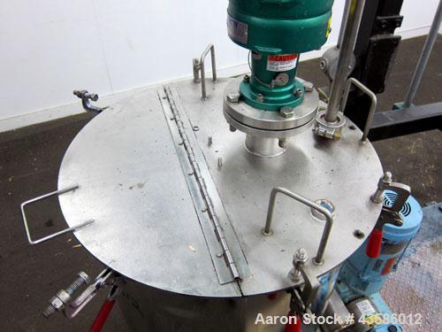 Used Graco Mixing System consisting of: (1) 45 Gallon Stainless Steel Graco Tan