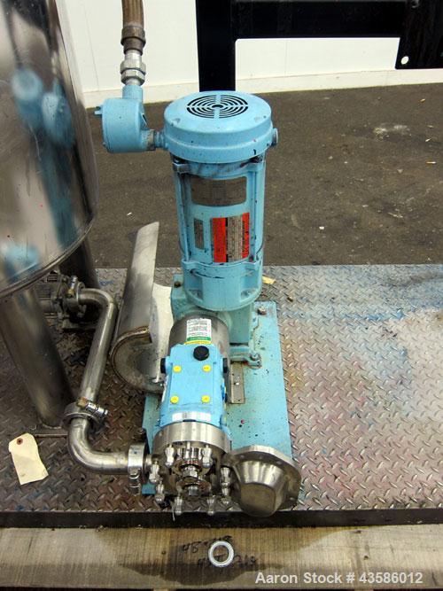 Used- Graco Mixing System consisting of: (1) 45 Gallon Stainless Steel Graco Tan