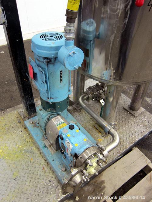 Used Graco Mixing System consisting of: (1) 45 Gallon Stainless Steel Graco Tan