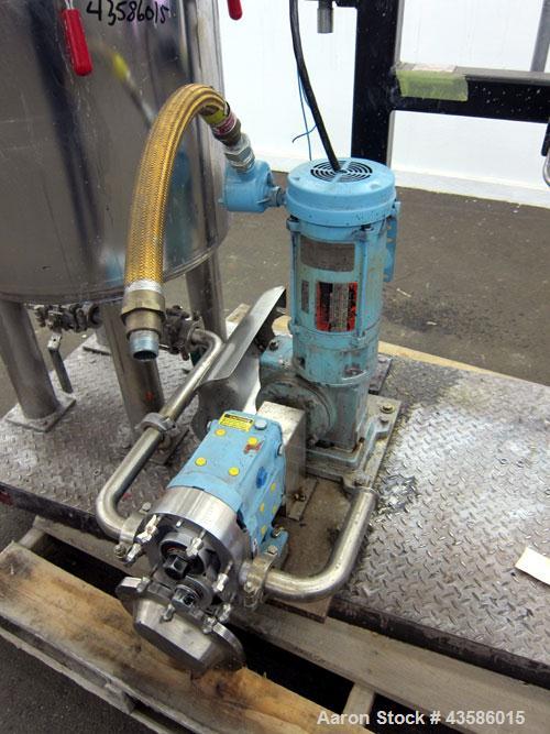 Used- Graco Mixing System consisting of: (1) 45 Gallon Stainless Steel Graco Tan