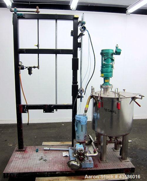Used Graco Mixing System consisting of: (1) 45 Gallon Stainless Steel Graco Tan