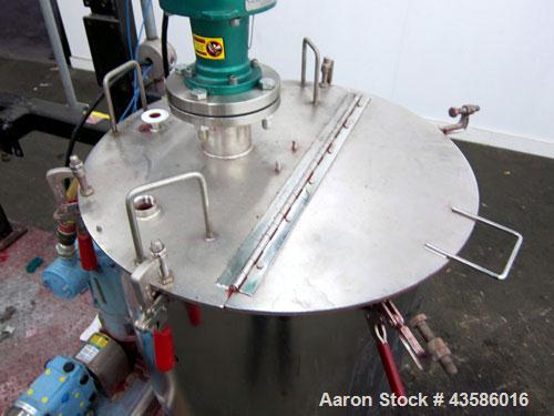 Used Graco Mixing System consisting of: (1) 45 Gallon Stainless Steel Graco Tan