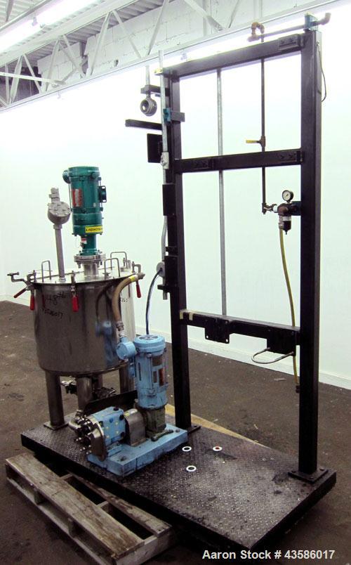 Used Graco Mixing System consisting of: (1) 45 Gallon Stainless Steel Graco Tan