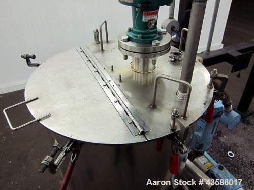 Used Graco Mixing System consisting of: (1) 45 Gallon Stainless Steel Graco Tan
