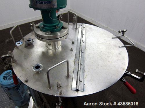 Used Graco Mixing System consisting of: (1) 45 Gallon Stainless Steel Graco Tan