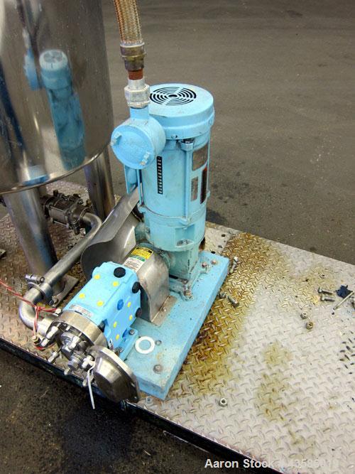 Used Graco Mixing System consisting of: (1) Graco tank, 45 gallon, 304 stainless steel. 24" Diameter x 21" straight side, open top with a 1/3 hinged clamp down cover, dished bottom. Approximate 1/2" ...