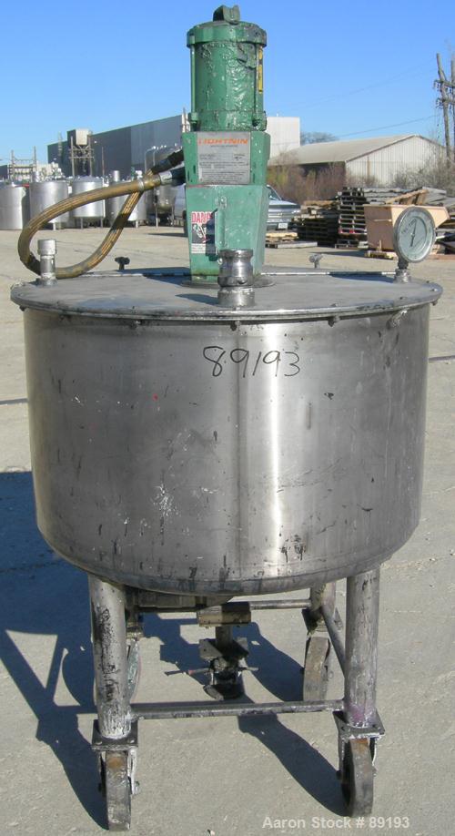 USED: Graco tank, 100 gallon, 304 stainless steel, vertical. 30" diameter x 20" straight side. Flat bolt on top with 1/4 hinged cover, dish bottom. Top entering Lightnin agitator, model XJCK-43. 1" d...