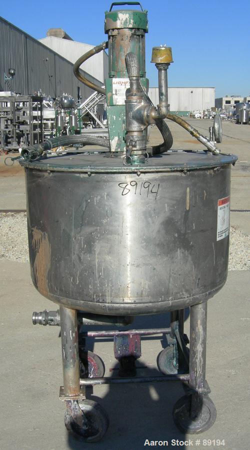 USED: Graco tank, 100 gallon, 304 stainless steel, vertical. 30" diameter x 20" straight side. Flat bolt on top with 1/4 hinged cover, dish bottom. Top entering Lightnin agitator, model XJCK-43. 1" d...