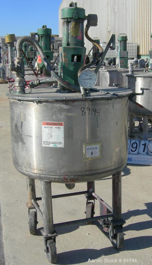 USED: Graco tank, 100 gallon, 304 stainless steel, vertical. 30" diameter x 20" straight side. Flat bolt on top with 1/4 hinged cover, dish bottom. Top entering Lightnin agitator, model XJCK-43. 1" d...