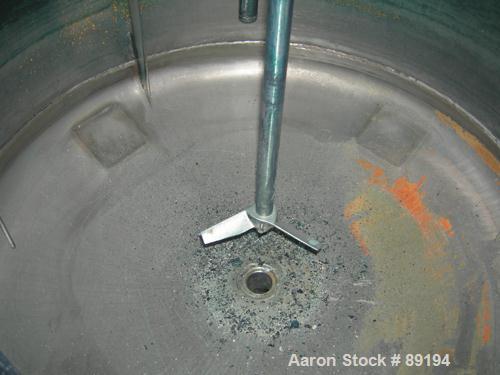 USED: Graco tank, 100 gallon, 304 stainless steel, vertical. 30" diameter x 20" straight side. Flat bolt on top with 1/4 hinged cover, dish bottom. Top entering Lightnin agitator, model XJCK-43. 1" d...