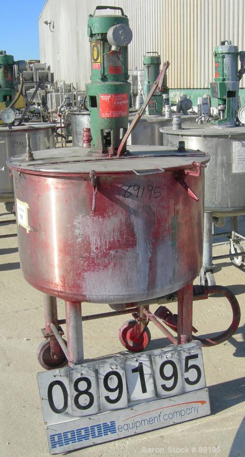 USED: Graco tank, 100 gallon, 304 stainless steel, vertical. 30" diameter x 20" straight side. Flat bolt on top with 1/4 hinged cover, dish bottom. Top entering Lightnin agitator, model XJCK-43. 1" d...