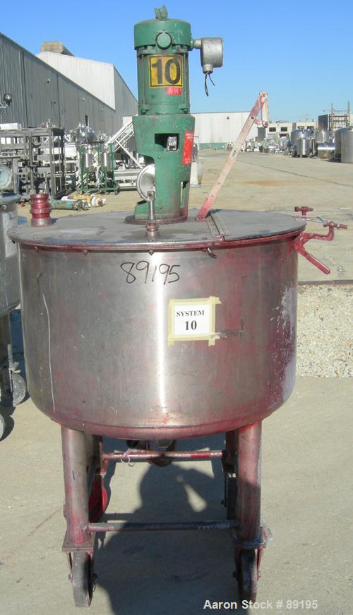 USED: Graco tank, 100 gallon, 304 stainless steel, vertical. 30" diameter x 20" straight side. Flat bolt on top with 1/4 hinged cover, dish bottom. Top entering Lightnin agitator, model XJCK-43. 1" d...