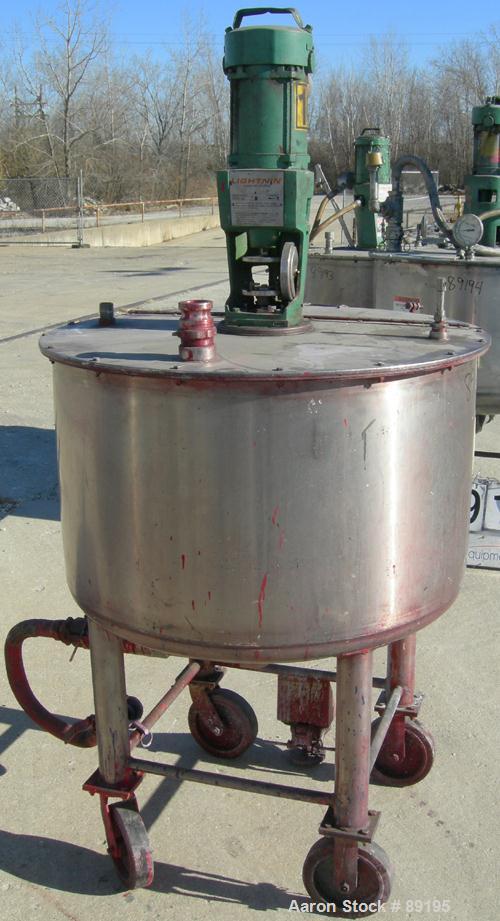 USED: Graco tank, 100 gallon, 304 stainless steel, vertical. 30" diameter x 20" straight side. Flat bolt on top with 1/4 hinged cover, dish bottom. Top entering Lightnin agitator, model XJCK-43. 1" d...