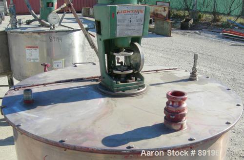 USED: Graco tank, 100 gallon, 304 stainless steel, vertical. 30" diameter x 20" straight side. Flat bolt on top with 1/4 hinged cover, dish bottom. Top entering Lightnin agitator, model XJCK-43. 1" d...