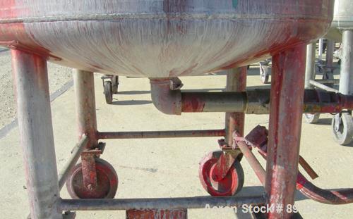 USED: Graco tank, 100 gallon, 304 stainless steel, vertical. 30" diameter x 20" straight side. Flat bolt on top with 1/4 hinged cover, dish bottom. Top entering Lightnin agitator, model XJCK-43. 1" d...