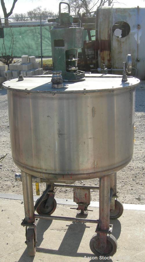 USED: Graco tank, 100 gallon, 304 stainless steel, vertical. 30" diameter x 20" straight side. Flat bolt on top with 1/4 hinged cover, dish bottom. Top entering air operated Lightnin agitator, model ...