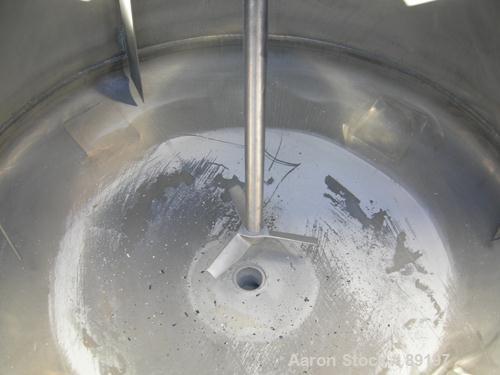 USED: Graco tank, 100 gallon, 304 stainless steel, vertical. 30" diameter x 20" straight side. Flat bolt on top with 1/4 hinged cover, dish bottom. Top entering air operated Lightnin agitator, model ...