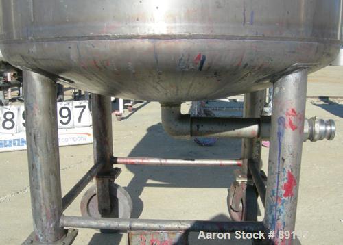 USED: Graco tank, 100 gallon, 304 stainless steel, vertical. 30" diameter x 20" straight side. Flat bolt on top with 1/4 hinged cover, dish bottom. Top entering air operated Lightnin agitator, model ...