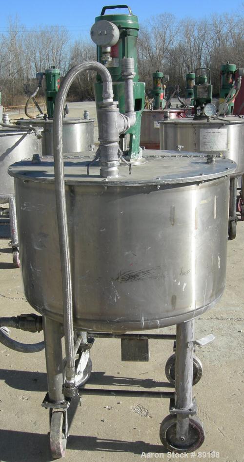 USED: Graco tank, 100 gallon, 304 stainless steel, vertical. 30" diameter x 20" straight side. Flat bolt on top with 1/4 hinged cover, dish bottom. Top entering Lightnin agitator, model XJCK-43. 1" d...
