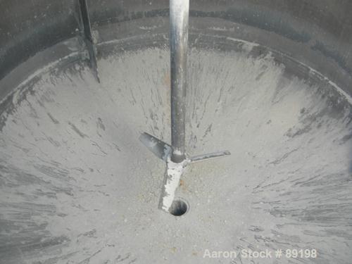 USED: Graco tank, 100 gallon, 304 stainless steel, vertical. 30" diameter x 20" straight side. Flat bolt on top with 1/4 hinged cover, dish bottom. Top entering Lightnin agitator, model XJCK-43. 1" d...